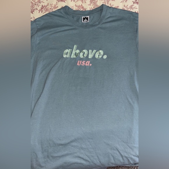 Above Millions Embroidered Tees - Picture 1 of 2